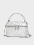 Arwen Metallic Quilted Top Handle Vanity Bag
